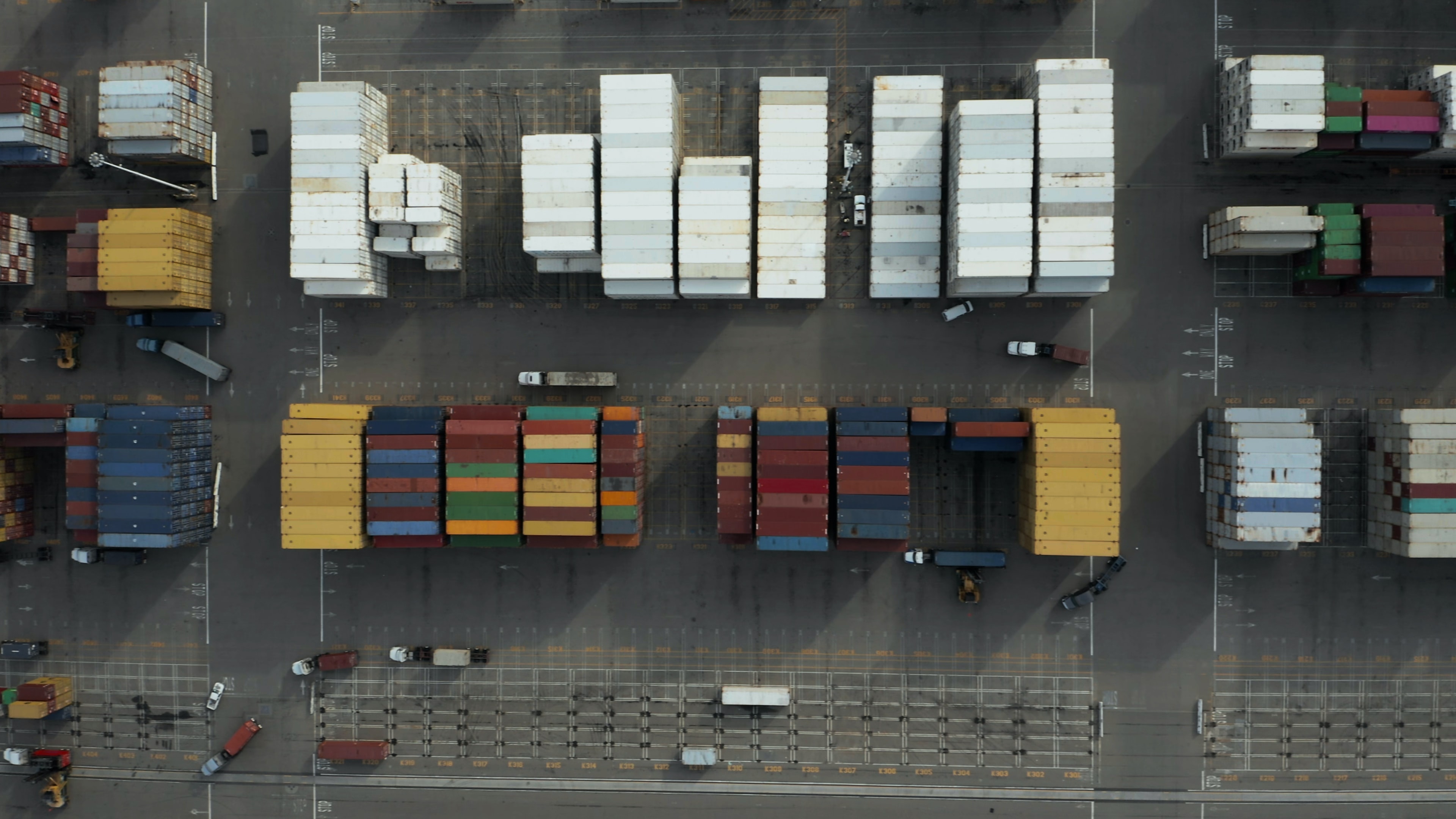 image of freight shipping containers ready to be loaded onto trucks or ships