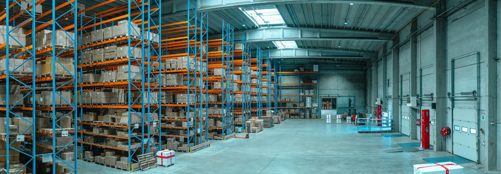 Many SKUs stacked on shelves in a fulfillment center