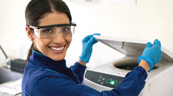 a happy science student in a lab