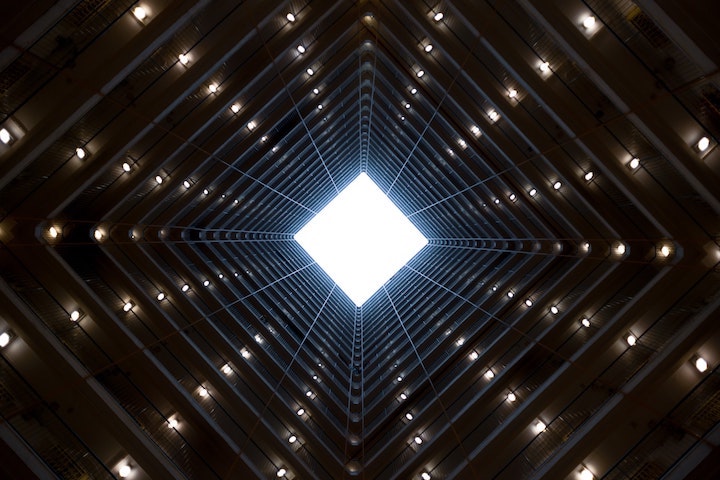 Worm's eye view of concrete building.