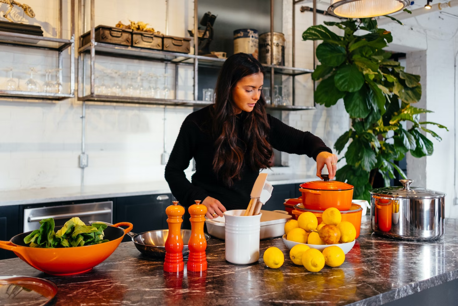 Latino woman preparing healthy meal in front of a clean kitchen