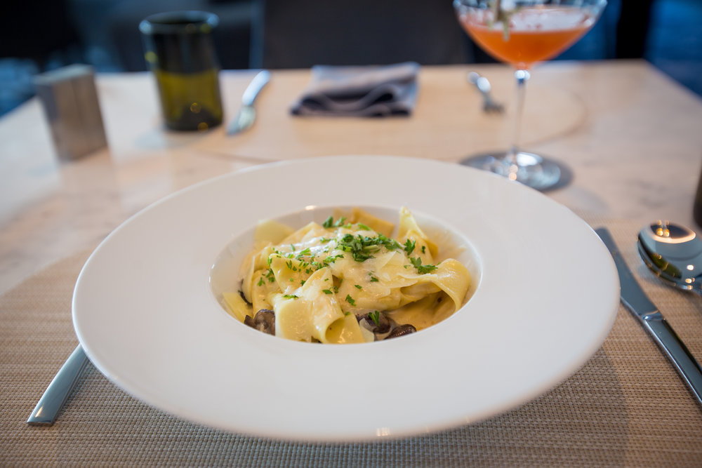 hand-cut pappardelle pasta with mushroom ragout