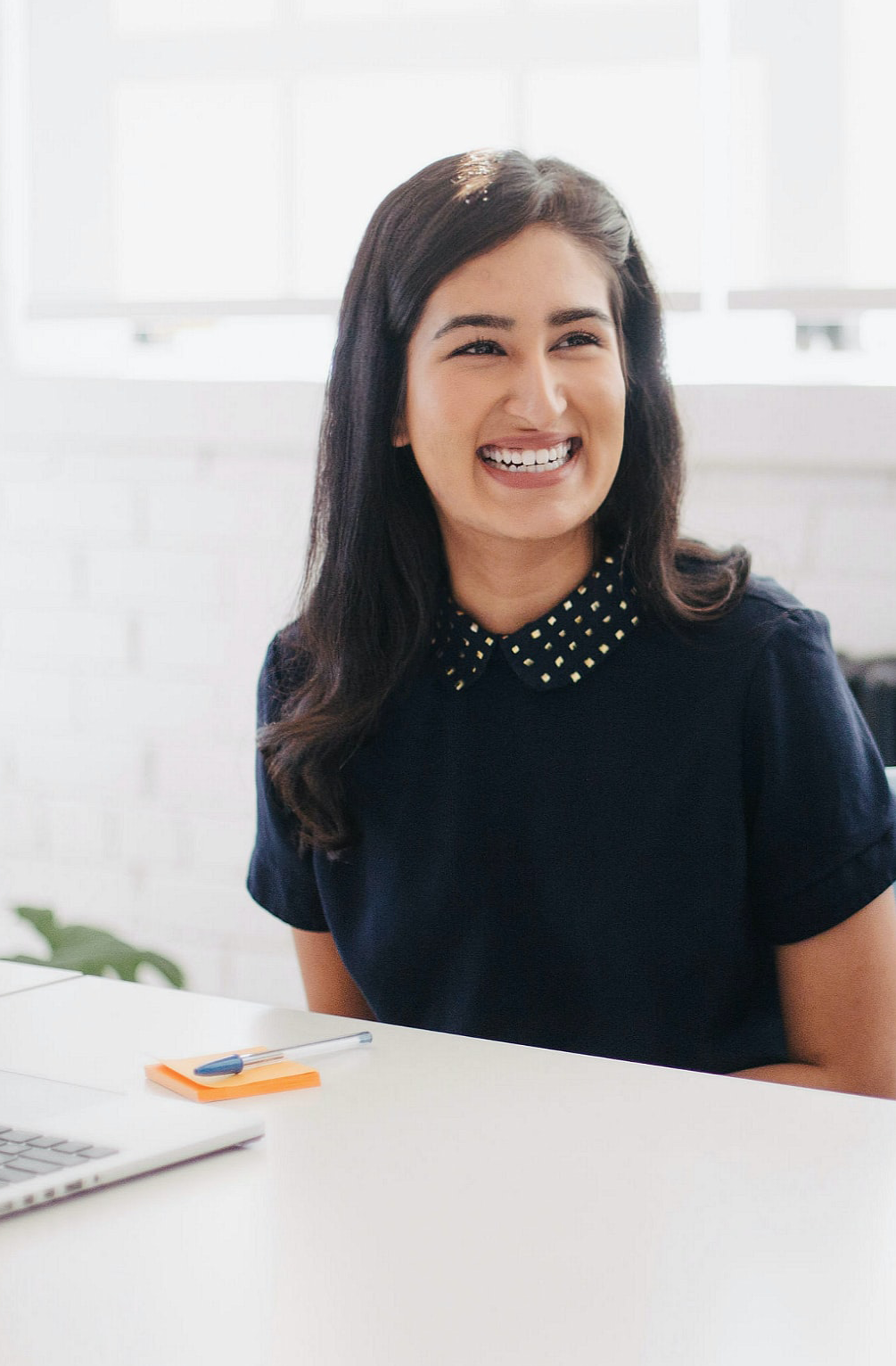 PowerPoint designer: Person sitting at a table