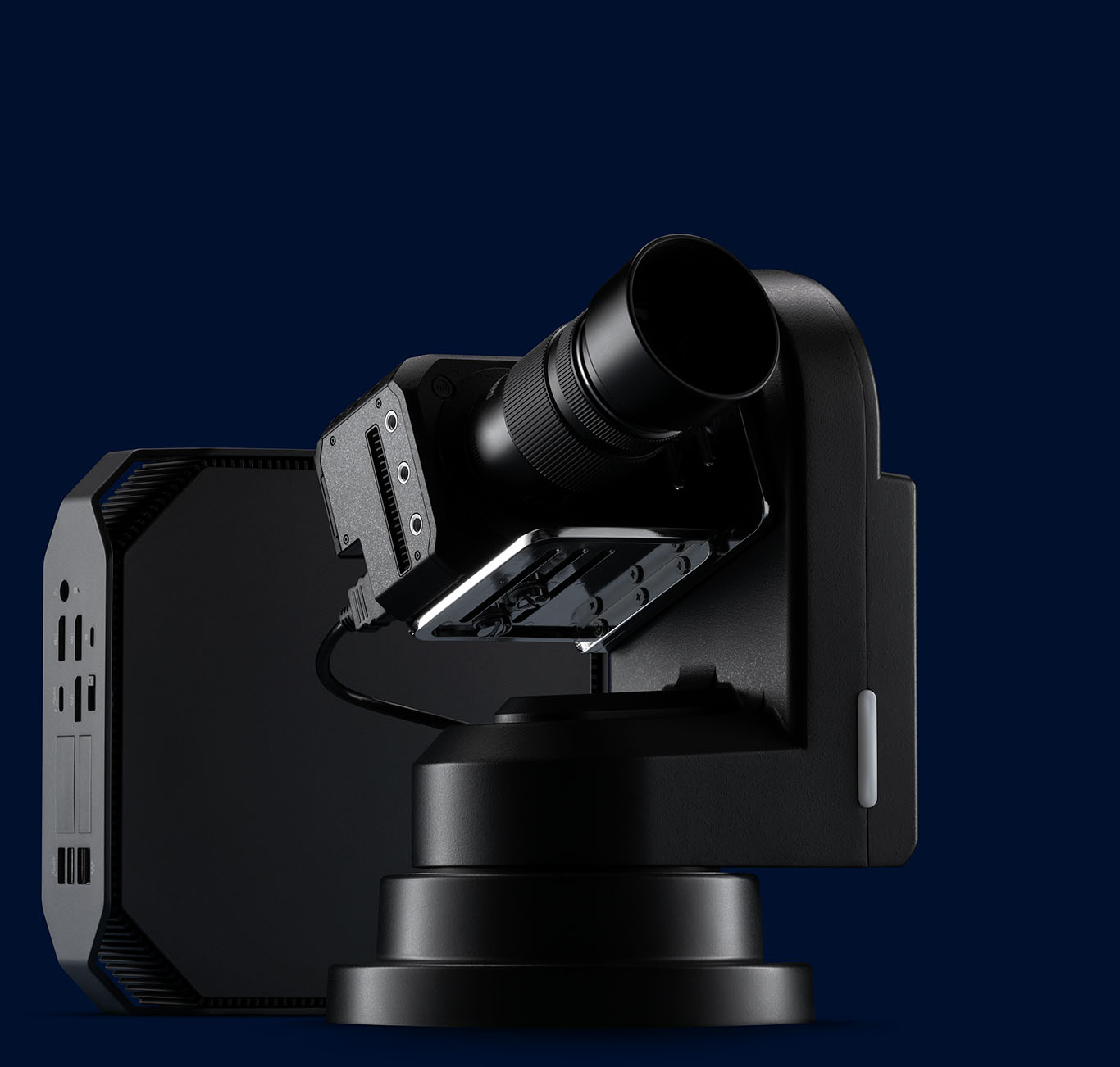 A cinema-quality camera positioned in front of a video encoder embodying the technology equipment that LiveControl sends to its customers.