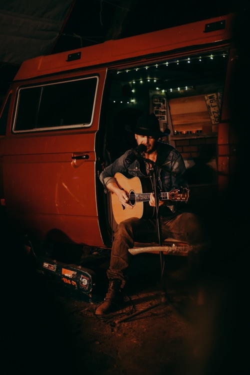 Paul Brandt playing out of a van at Socality Camp in 2017.