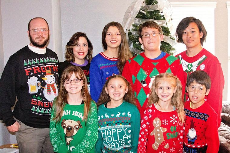 Host family poses for annual family Christmas card