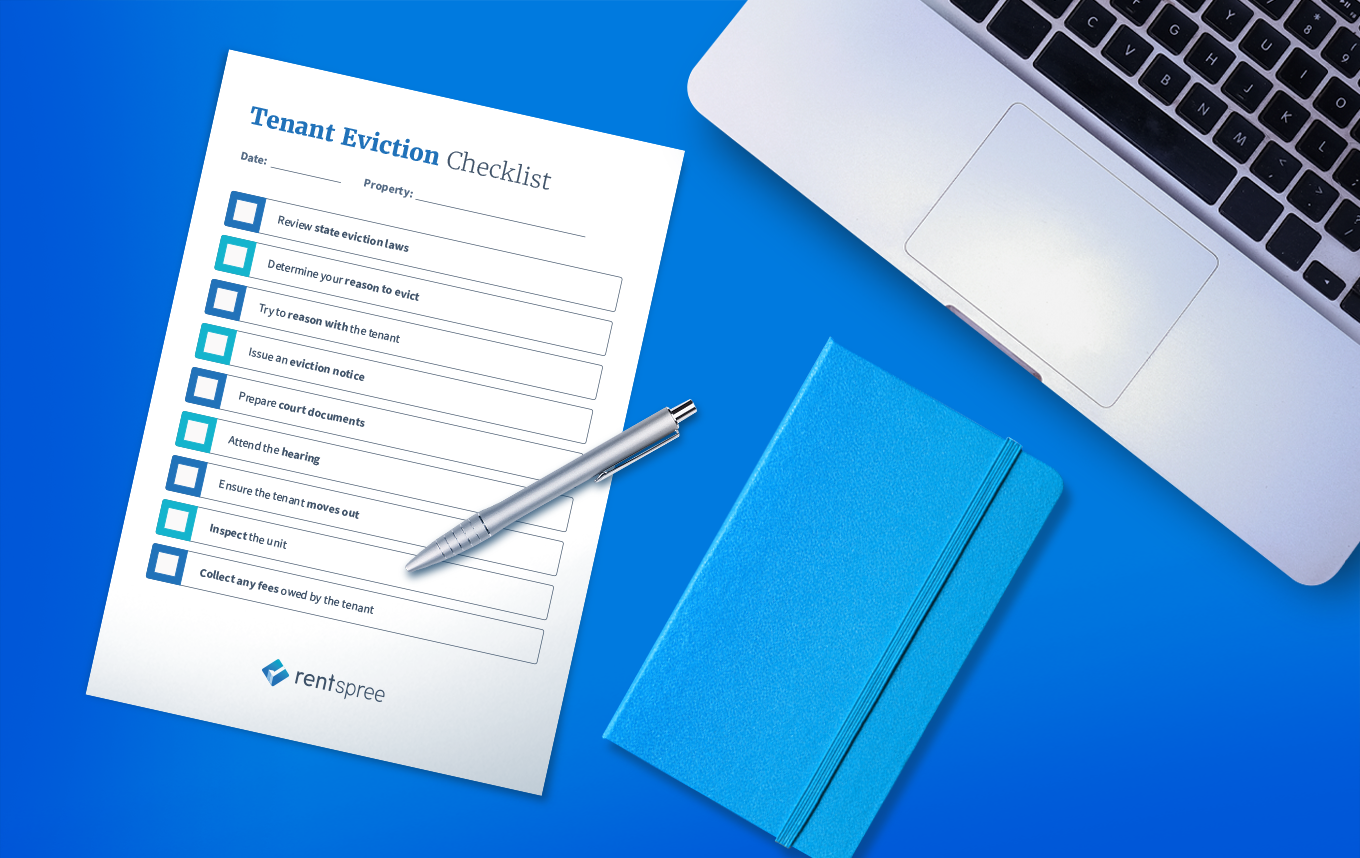 tenant eviction checklist next to a laptop.