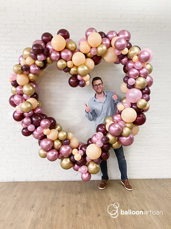 Balloon heart garland for a party made by balloon decorators in Denver Colorado.