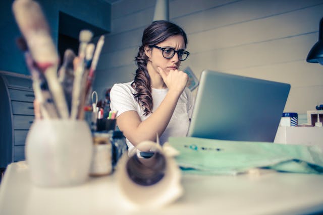 female student working on laptop