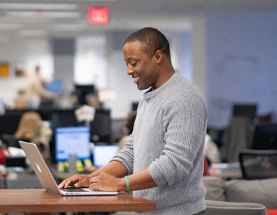 Employee working on their laptop