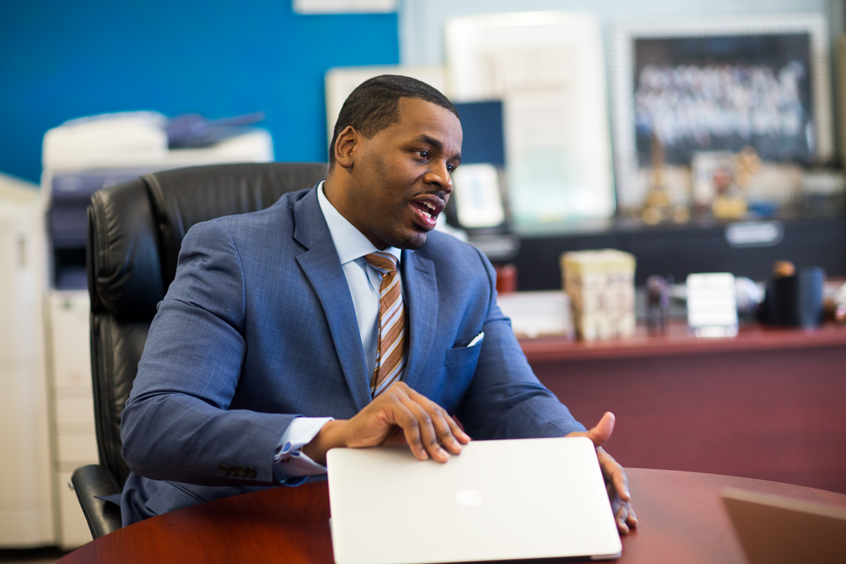 New Leaders Alumnus at a desk