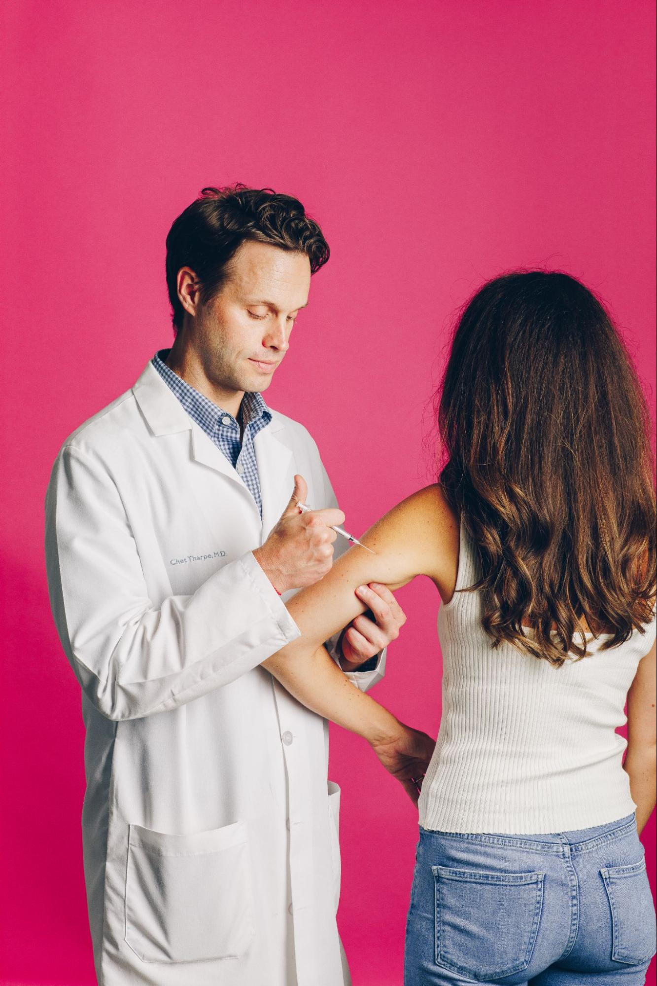 doctor giving patient a shot