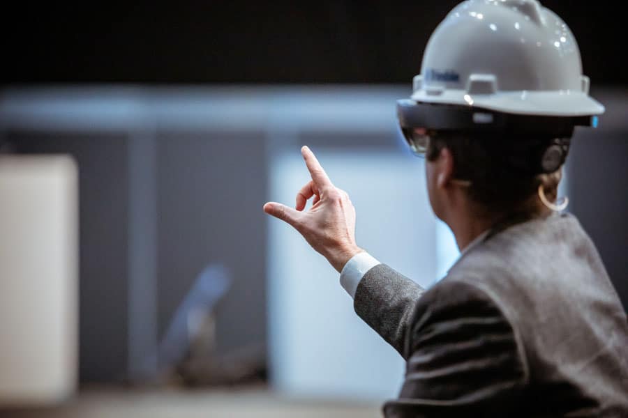 Man with a helmet and VR goggle