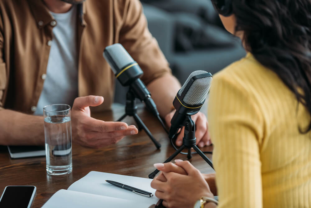 People recording a podcast