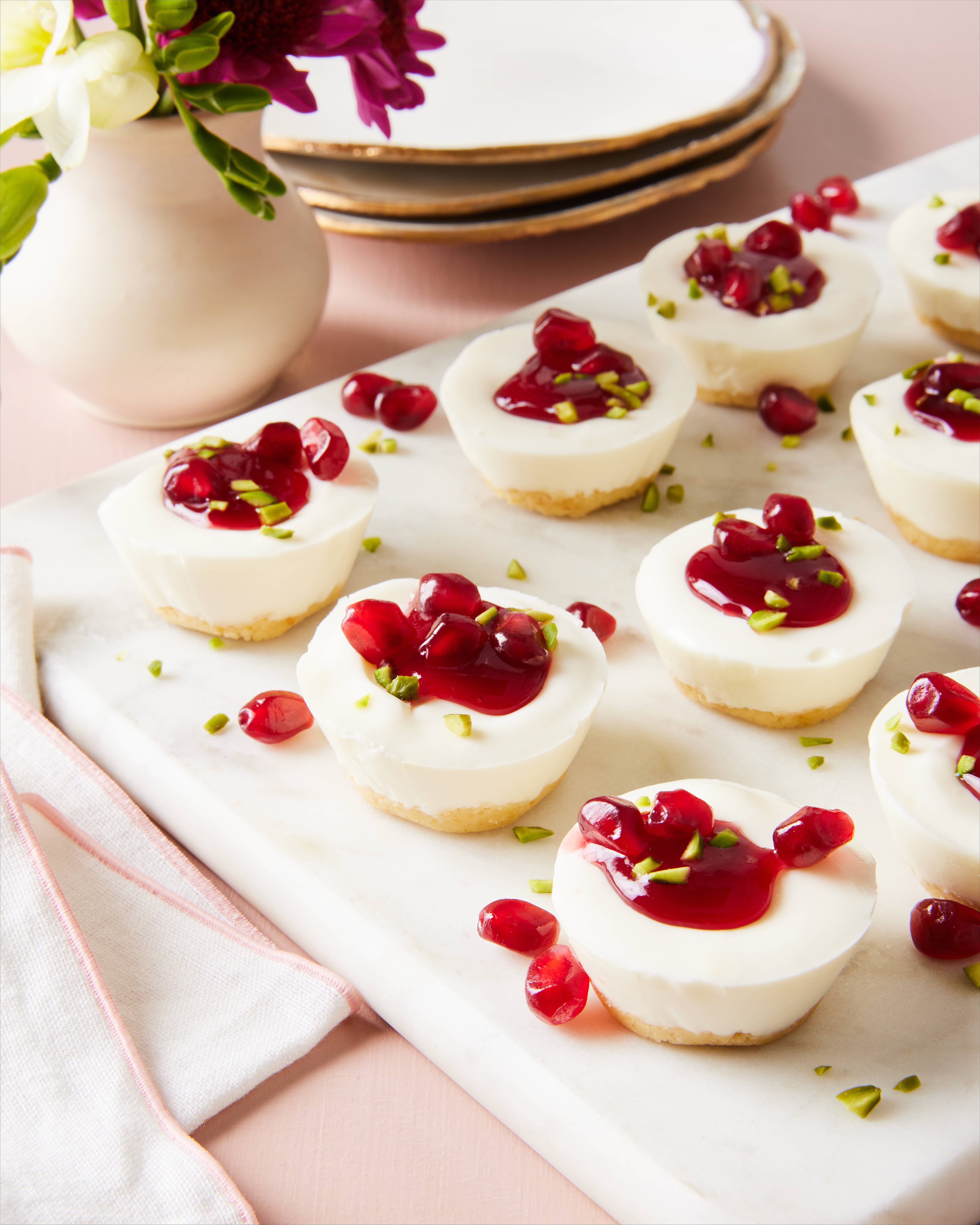 Yogurt Cheesecake Bites with Vanilla Pomegranate Sauce POM Wonderful