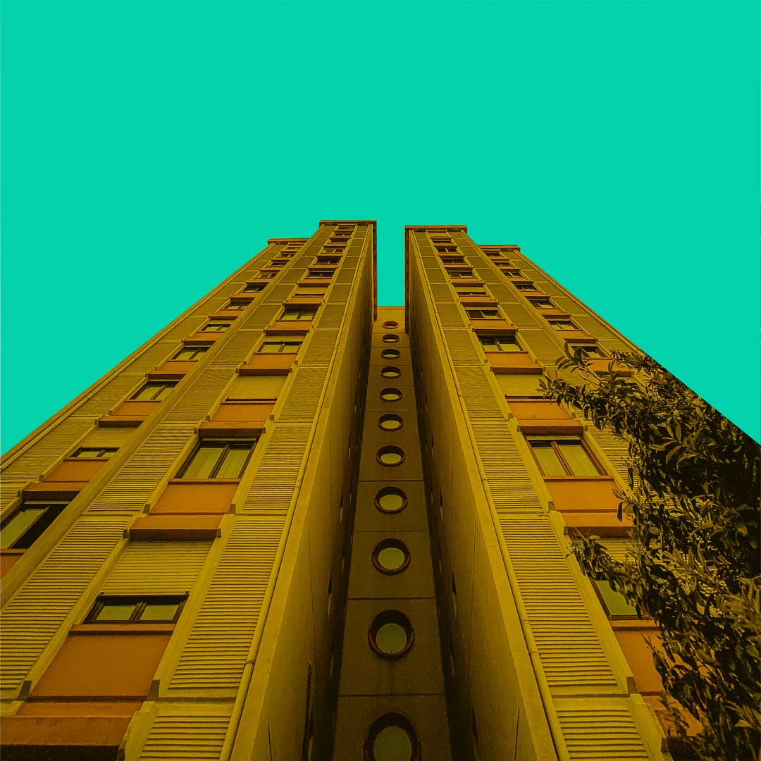 Yellow building with green sky