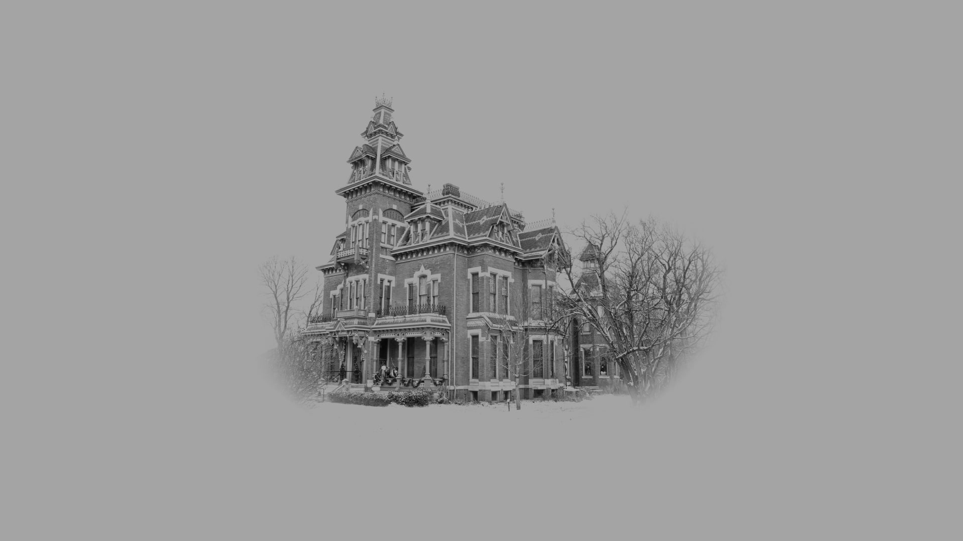 Ominous Victorian mansion in black-and-white emblazoned on grey