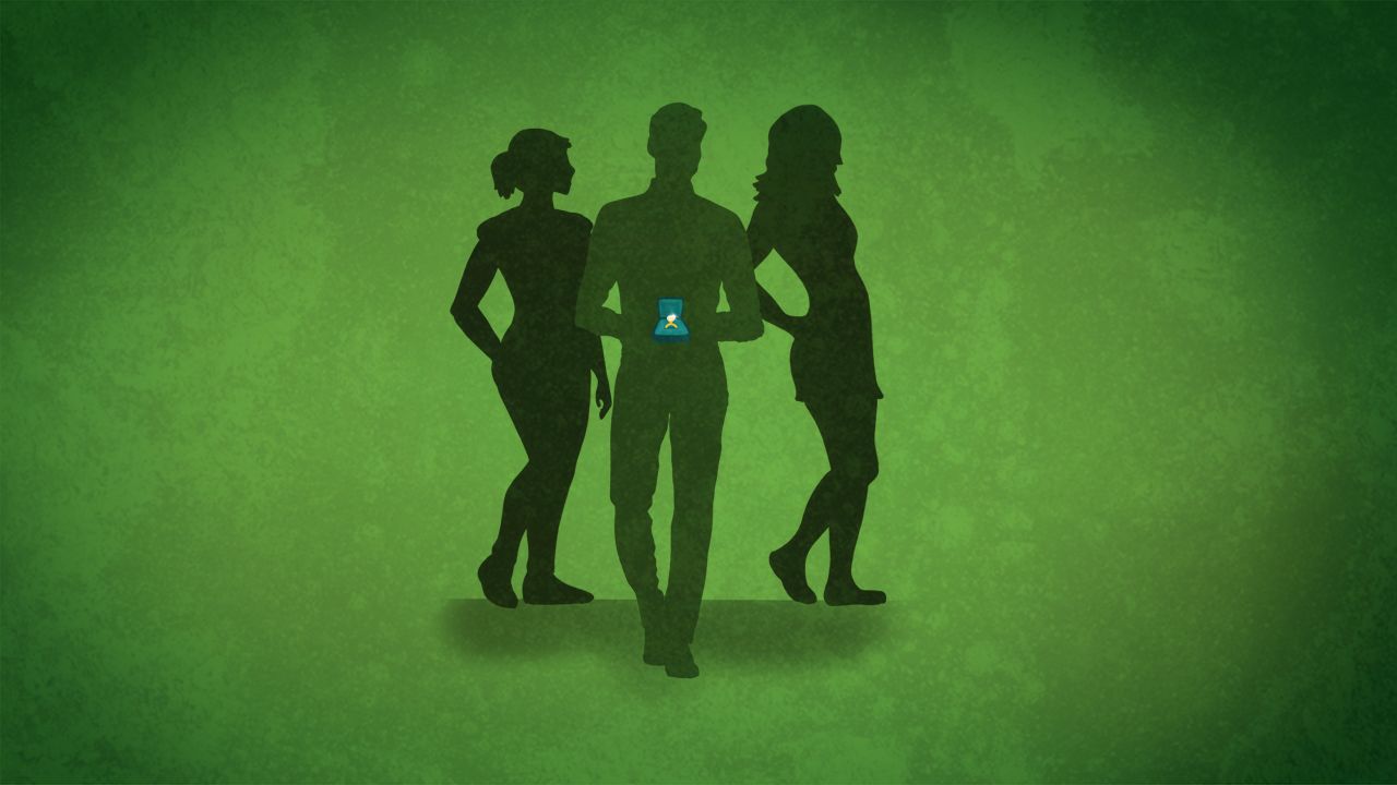 Green background with silhouette of 3 people, a man in the middle holding a ring box surrounded by two women on either side.