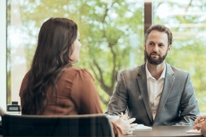Christensen Group Insurance agent listening to a client