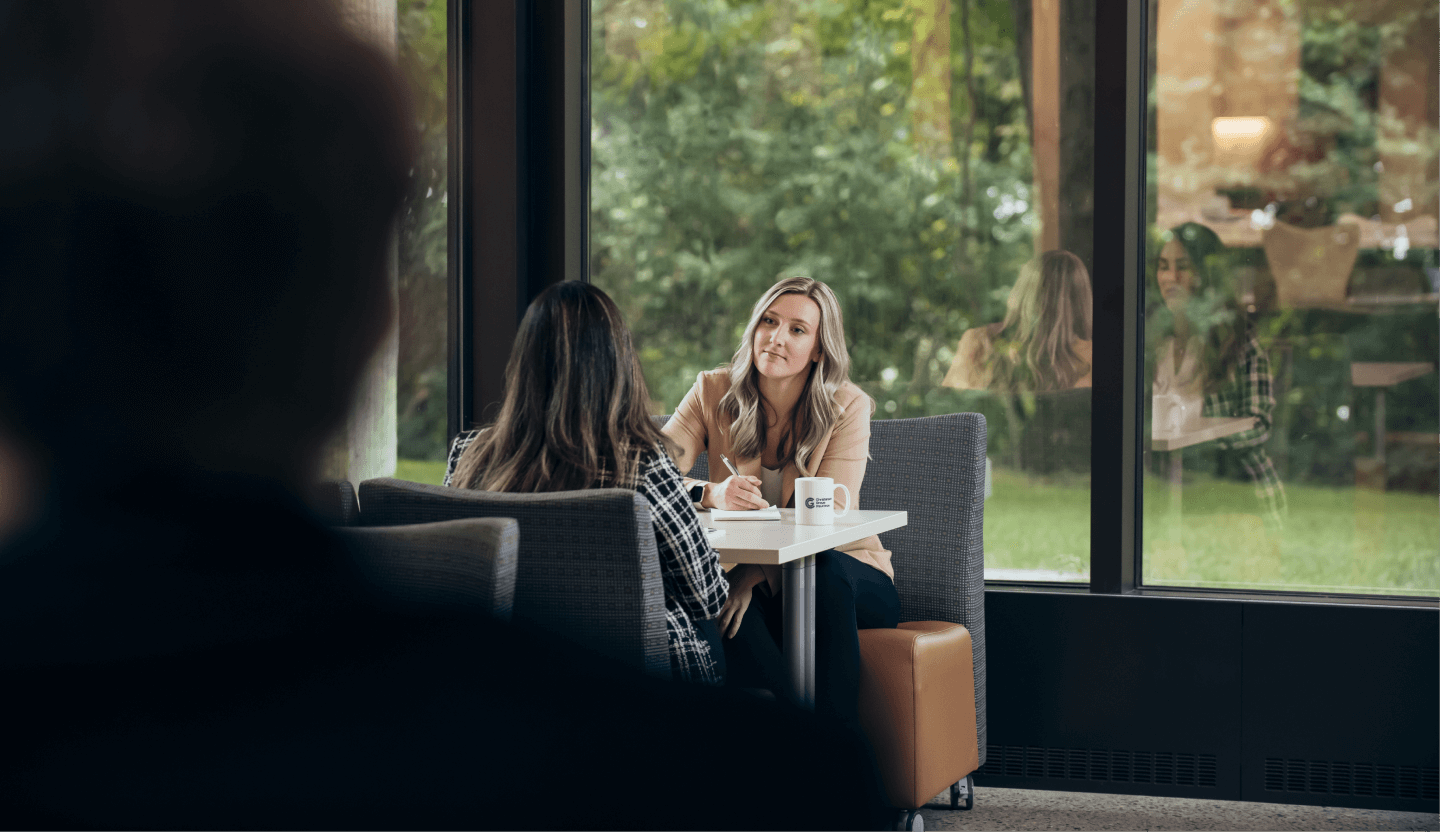 Christensen Group Insurance agent listening to a client