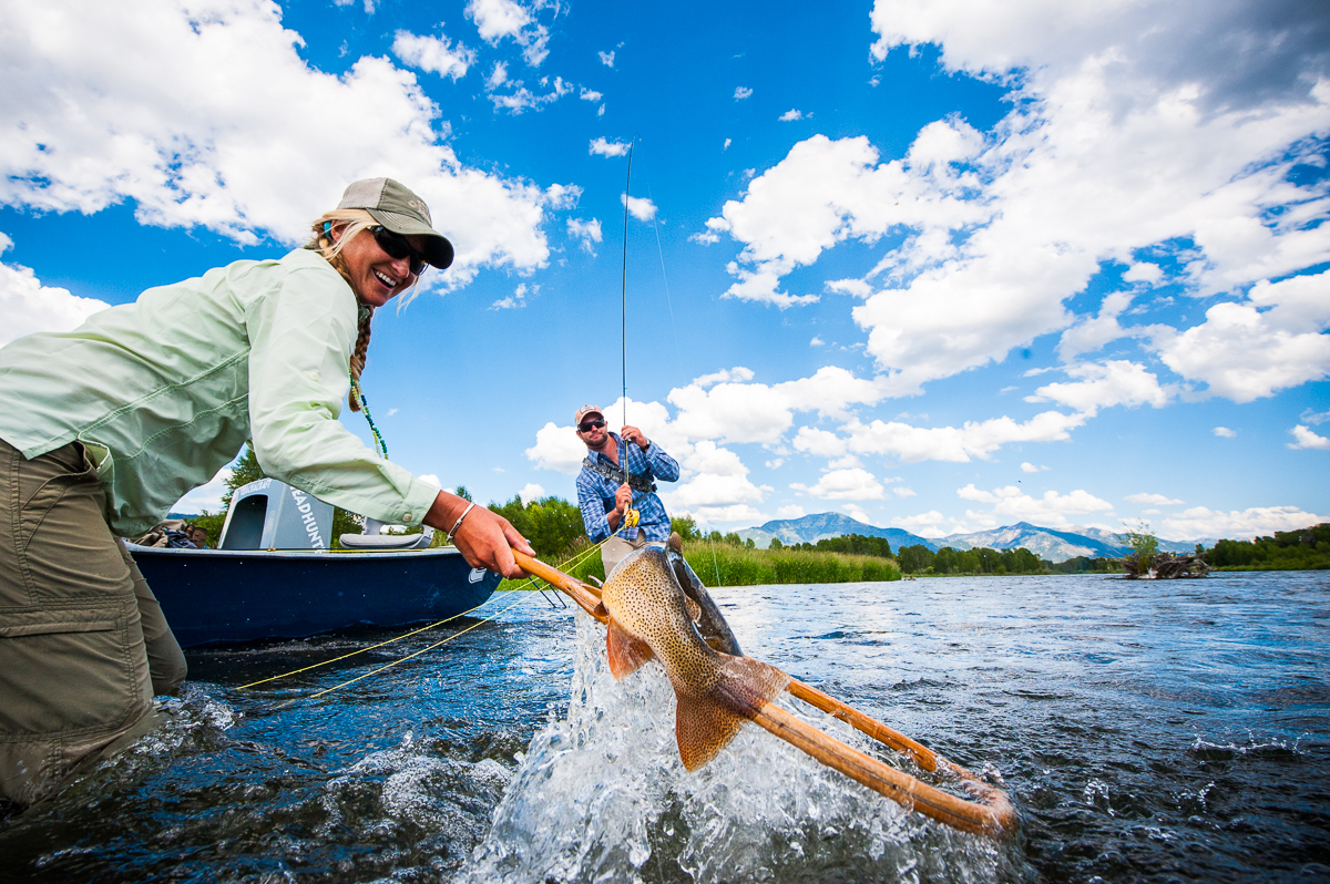 people fishing in boat