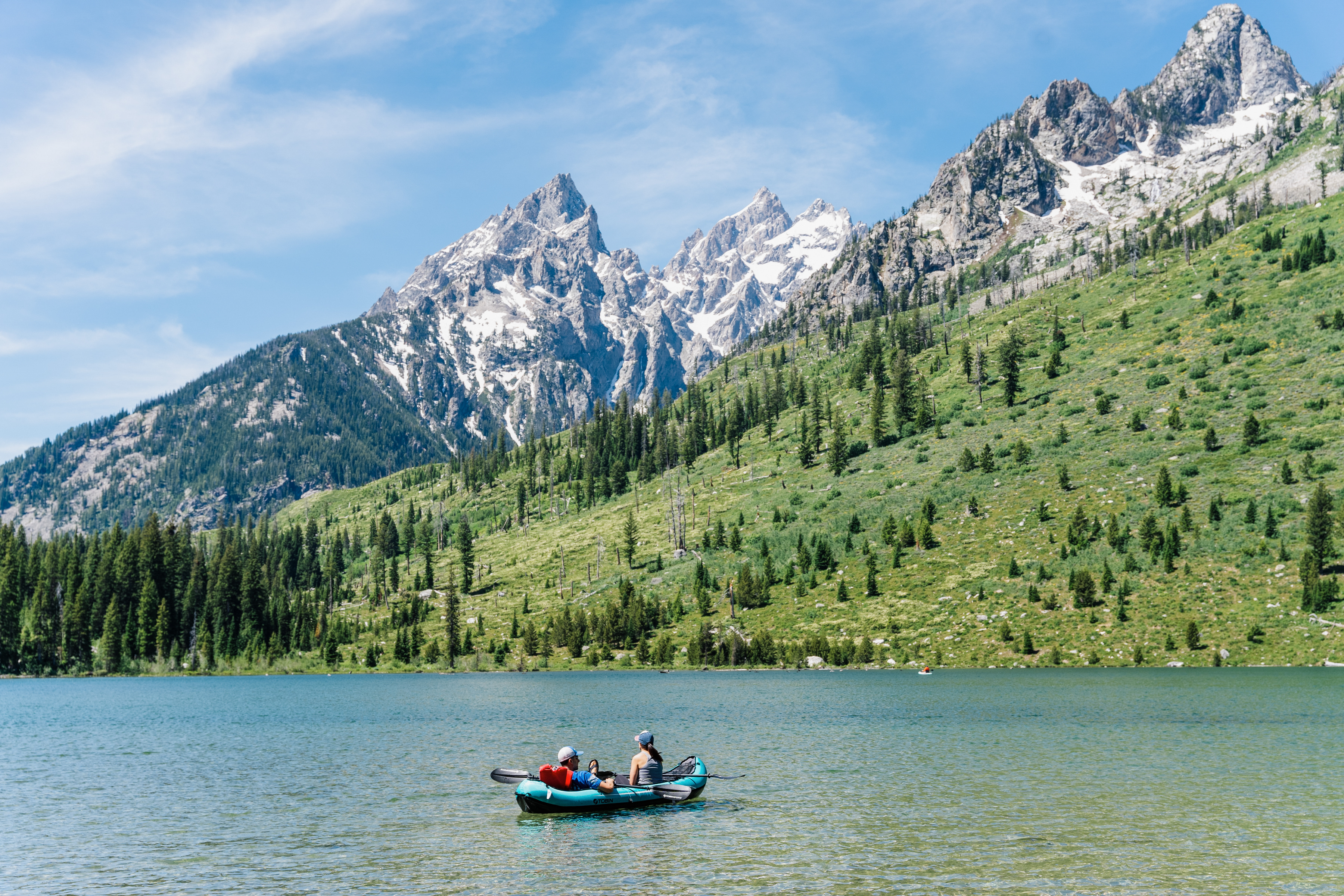 Lake view with people on a canoe