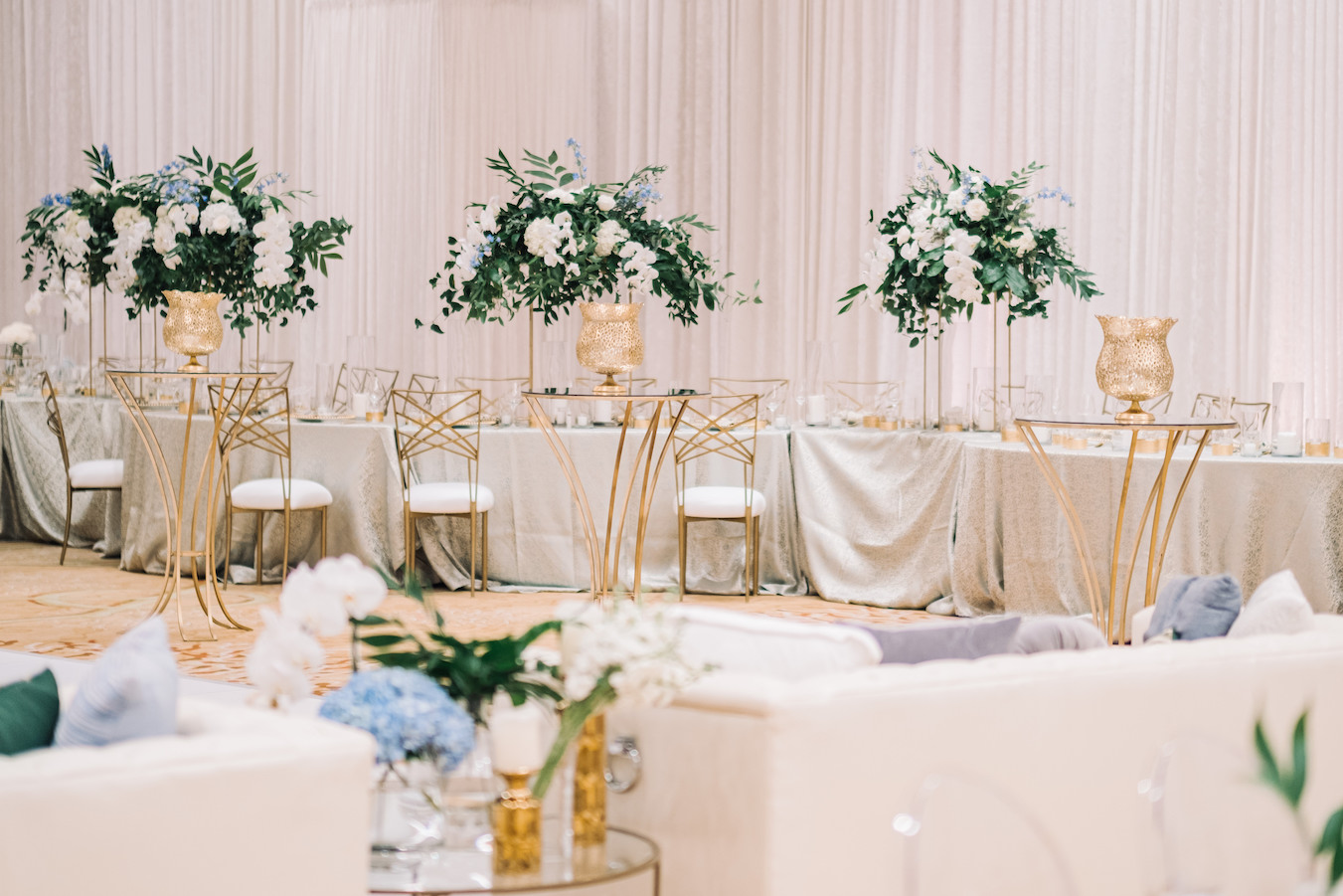 An arrangement of wedding flowers in the Destin Ballroom at The Henderson Beach Resort