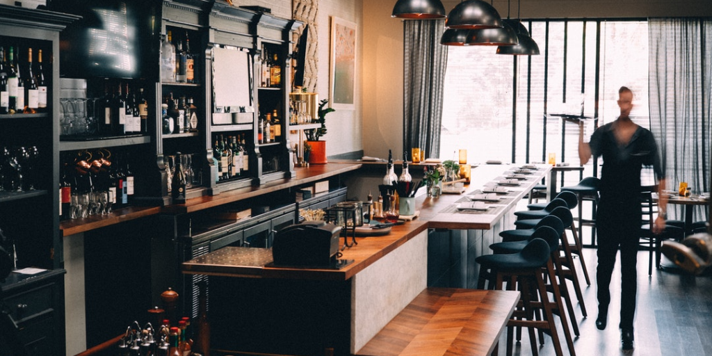 Waiter in wine bar