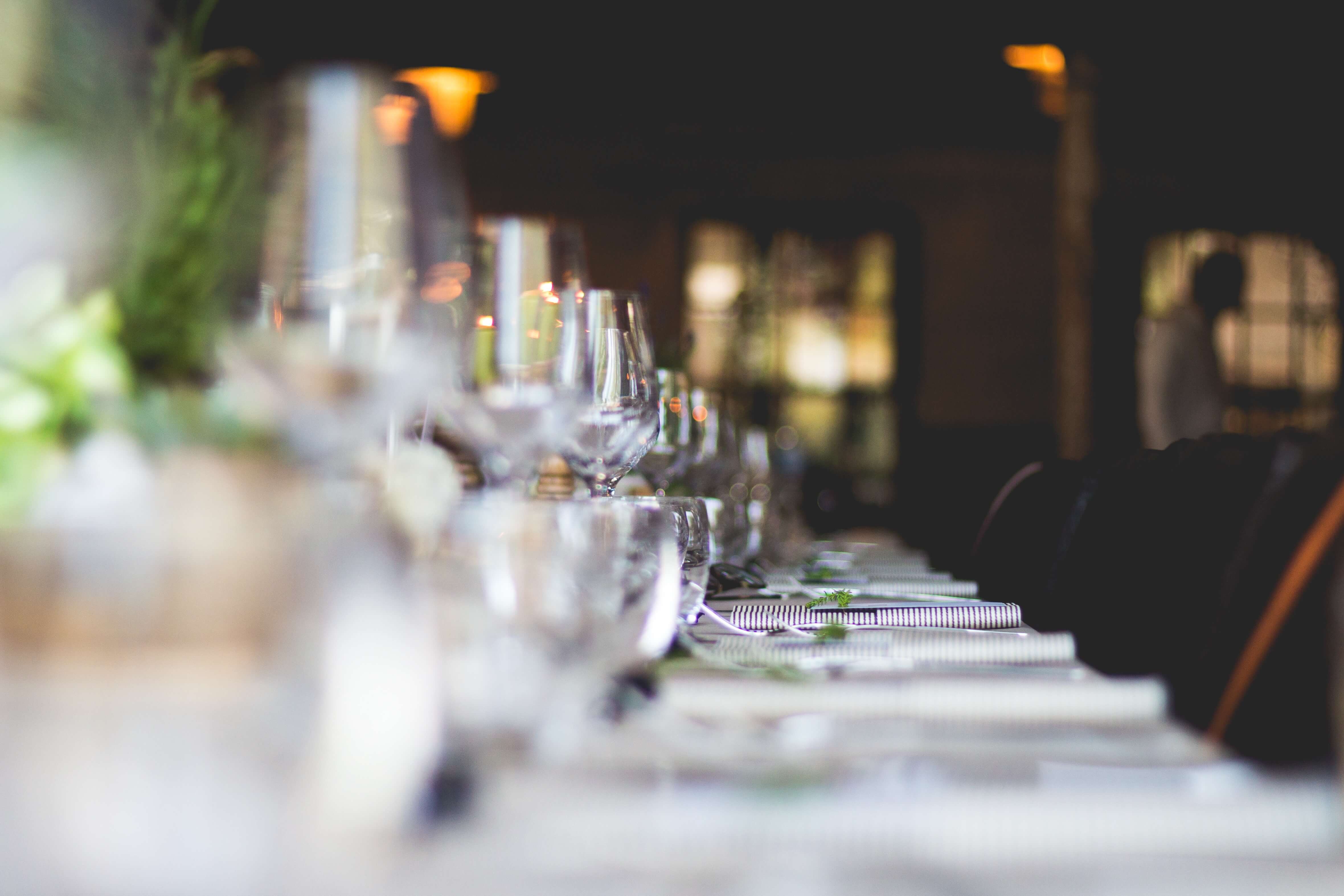 Close up of wine glasses on table