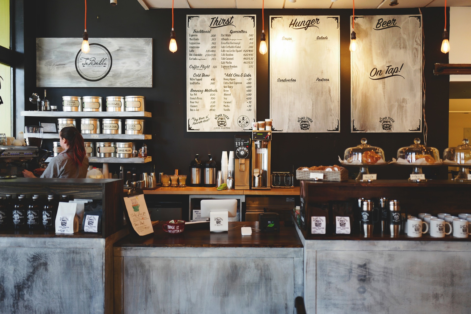 A barista working in a coffee shop