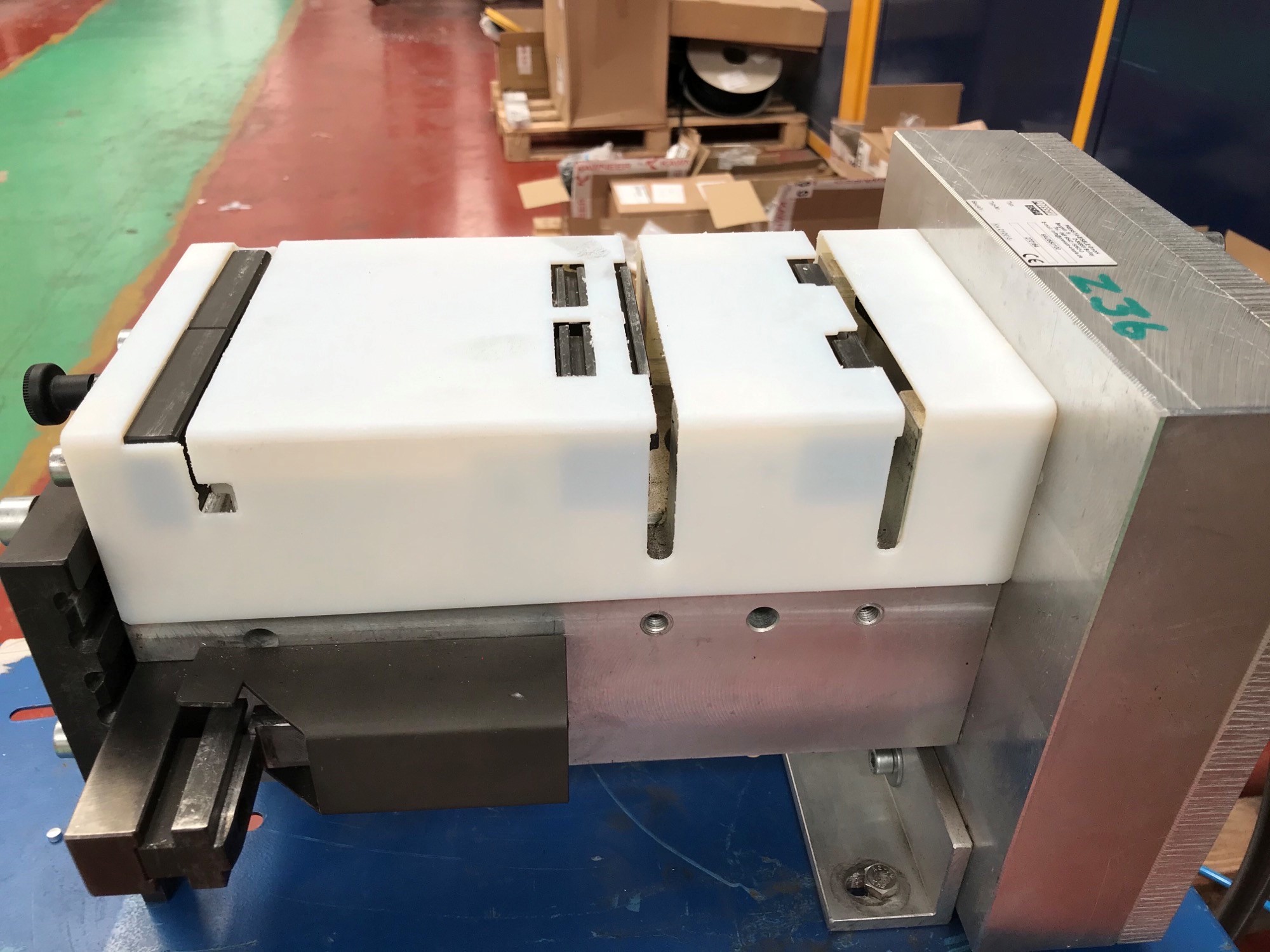 Kawneer, a leading manufacturer of architectural aluminium systems, was looking for a solution to help them improve safety and efficiency in the production of their AA720 standard casement window press tool. They turned to Innovolo for help, and we developed a custom guarding solution that fit their specific needs.
