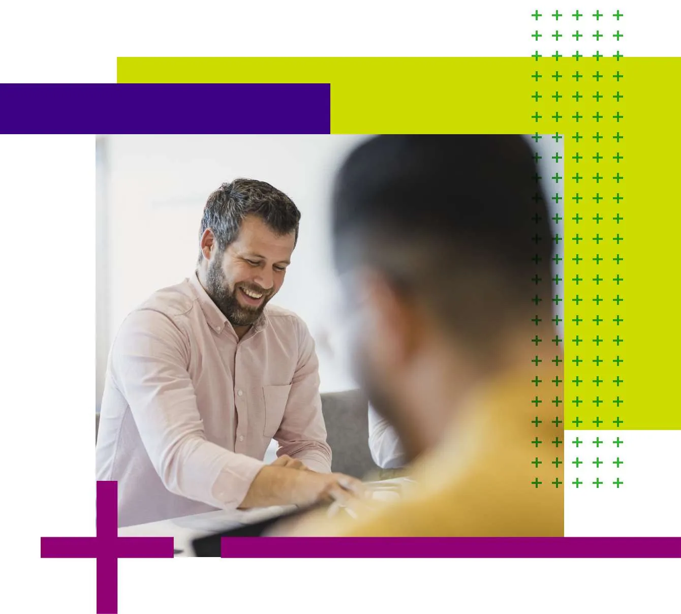 A man in a soft pink shirt with a silver bread, laughing and discussing Rebate trading partners.