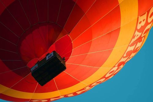 Hot air balloon being lifted up. 