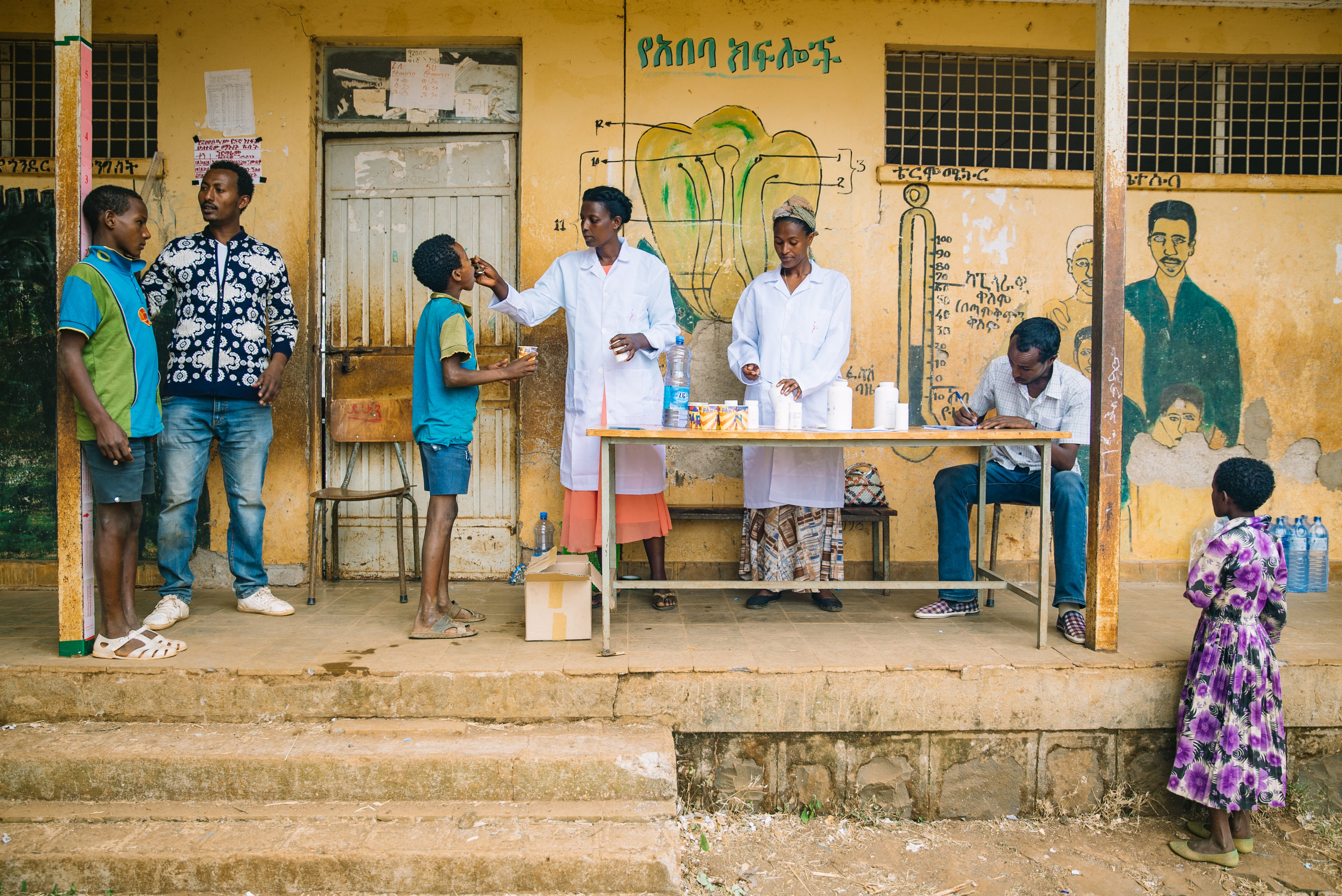 Children receiving medical care at a clinic