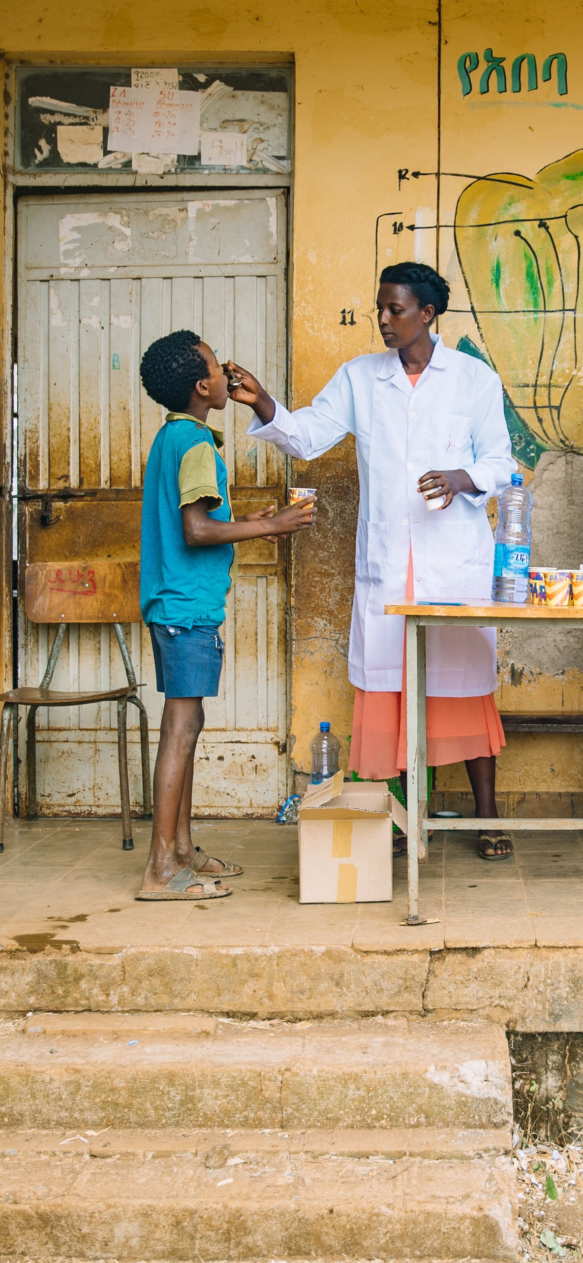 Children receiving medical care at a clinic