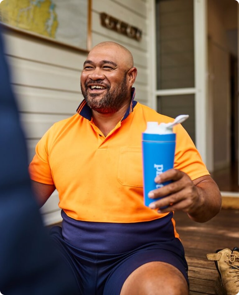 man holding a Weight shake