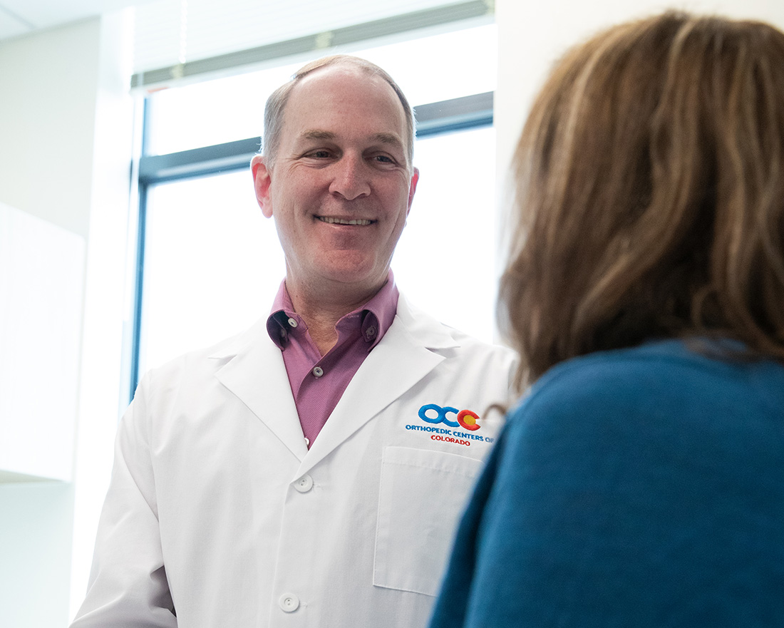 Dr. talking to patient