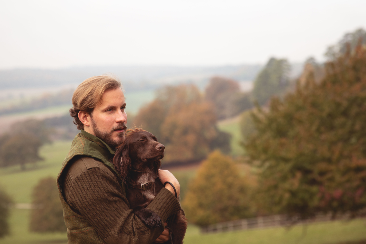 Man hugging his dog