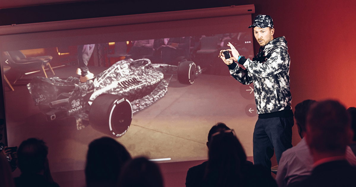 Alfa Romeo staff member presenting the C42 race car Jig at the partners' conference in Italy prior to car launch..