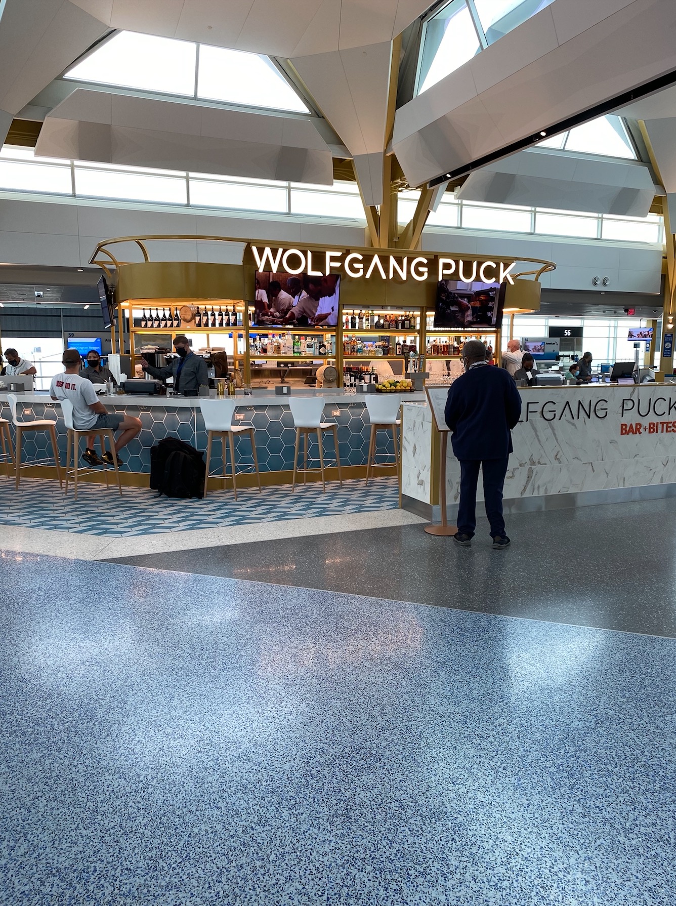 Wolfgang Puck Bar + Bites, Washington | ELM Surfaces | Luxury Italian ...