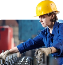 female manufacturing worker in high vis and hard hat