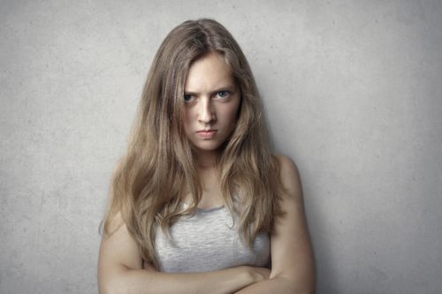 A person with an angry expression.
