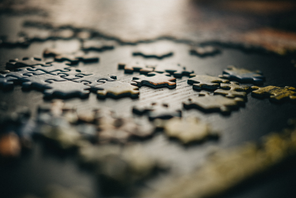 an incomplete puzzle on a table