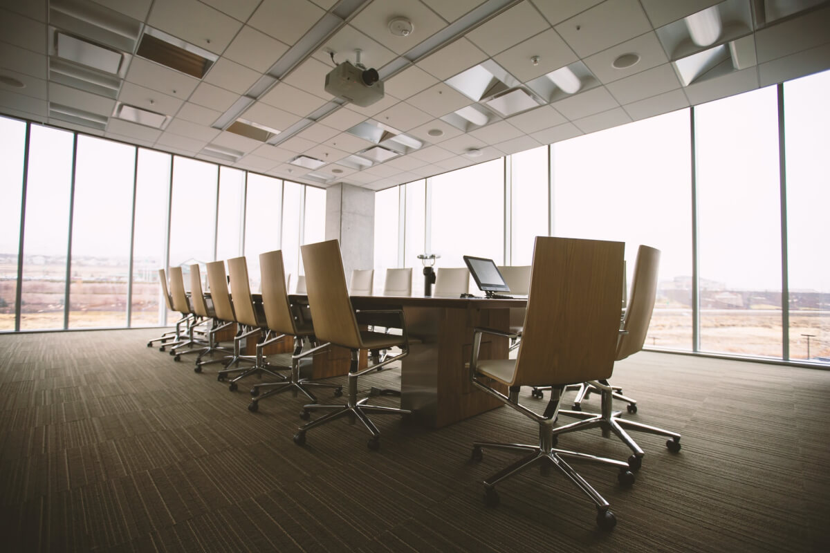 A office conference room with a table and chairs