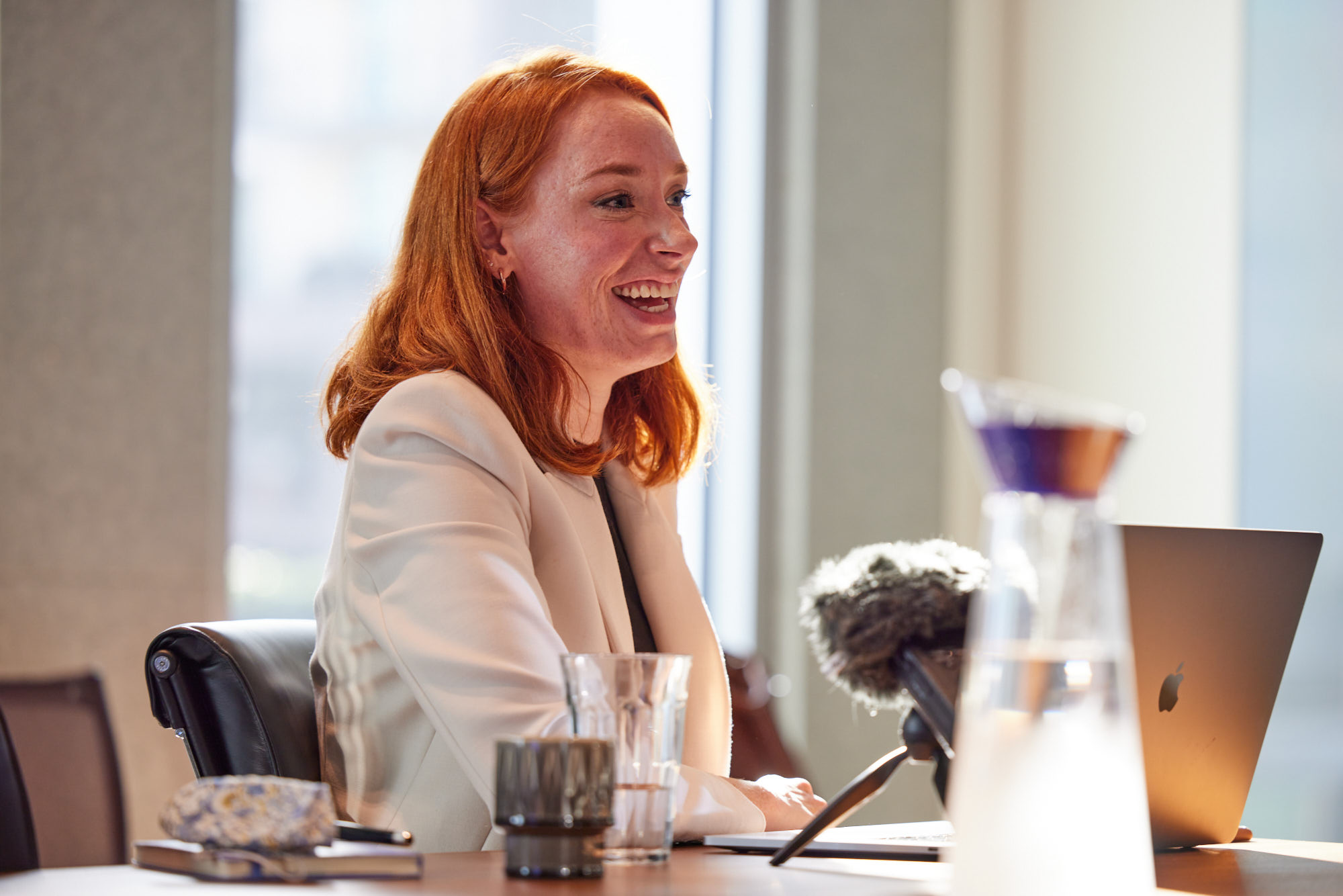 Hannah Fry recording an interview for DeepMind: The Podcast