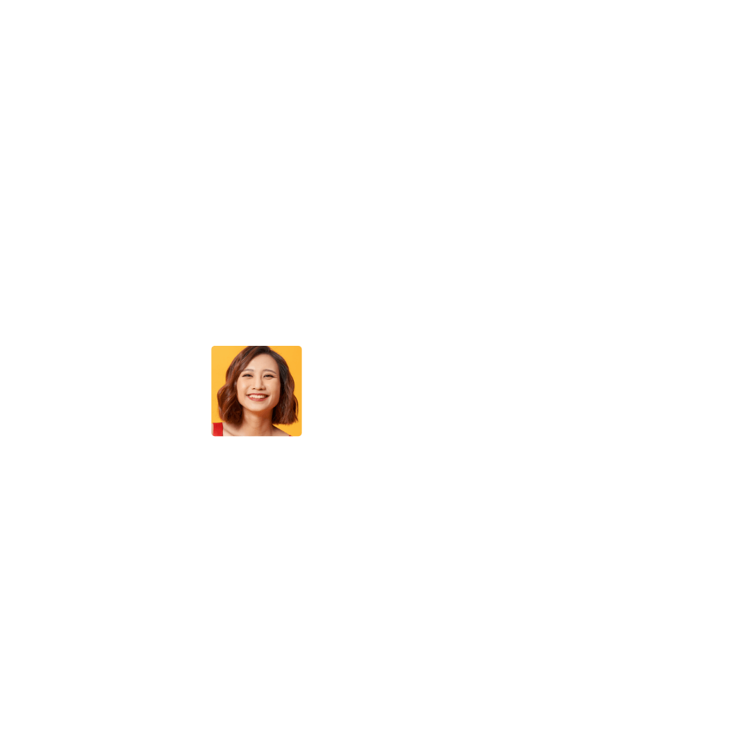 Lyla Greggs, a smiling woman with short brown hair