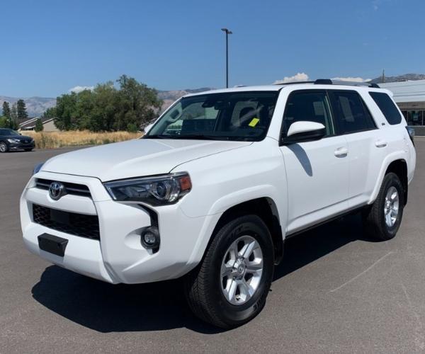 A white 2022 Toyota 4Runner in an empty parking lot