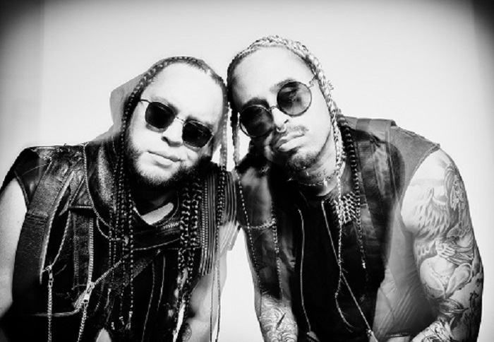 The members of Snotty Nosed REZ kids pose next to each other.