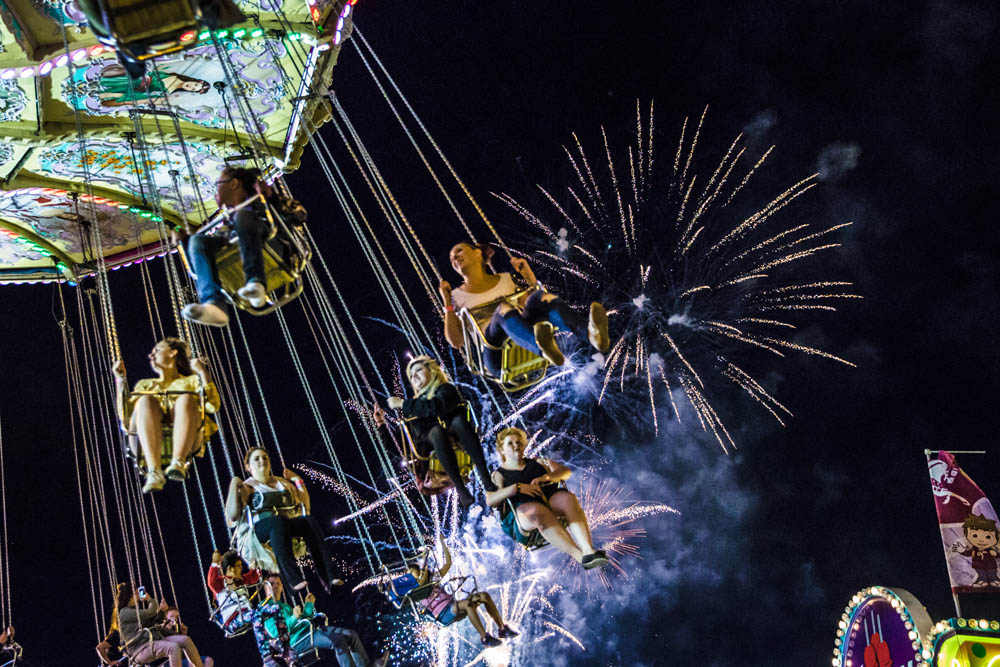 K-Days fireworks with people on swing