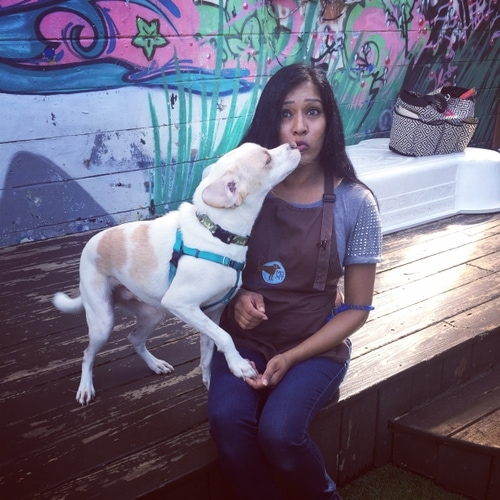 White dog kissing Menoka